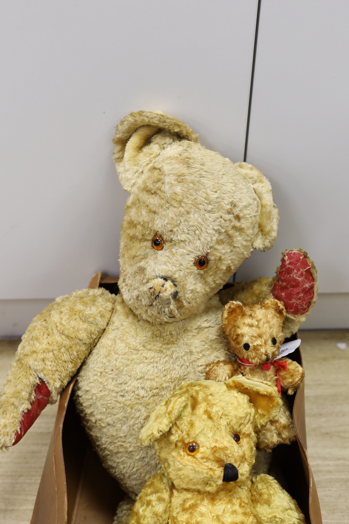 Three 20th century, 1950’s cotton plush teddy bears, tallest 78 cms high